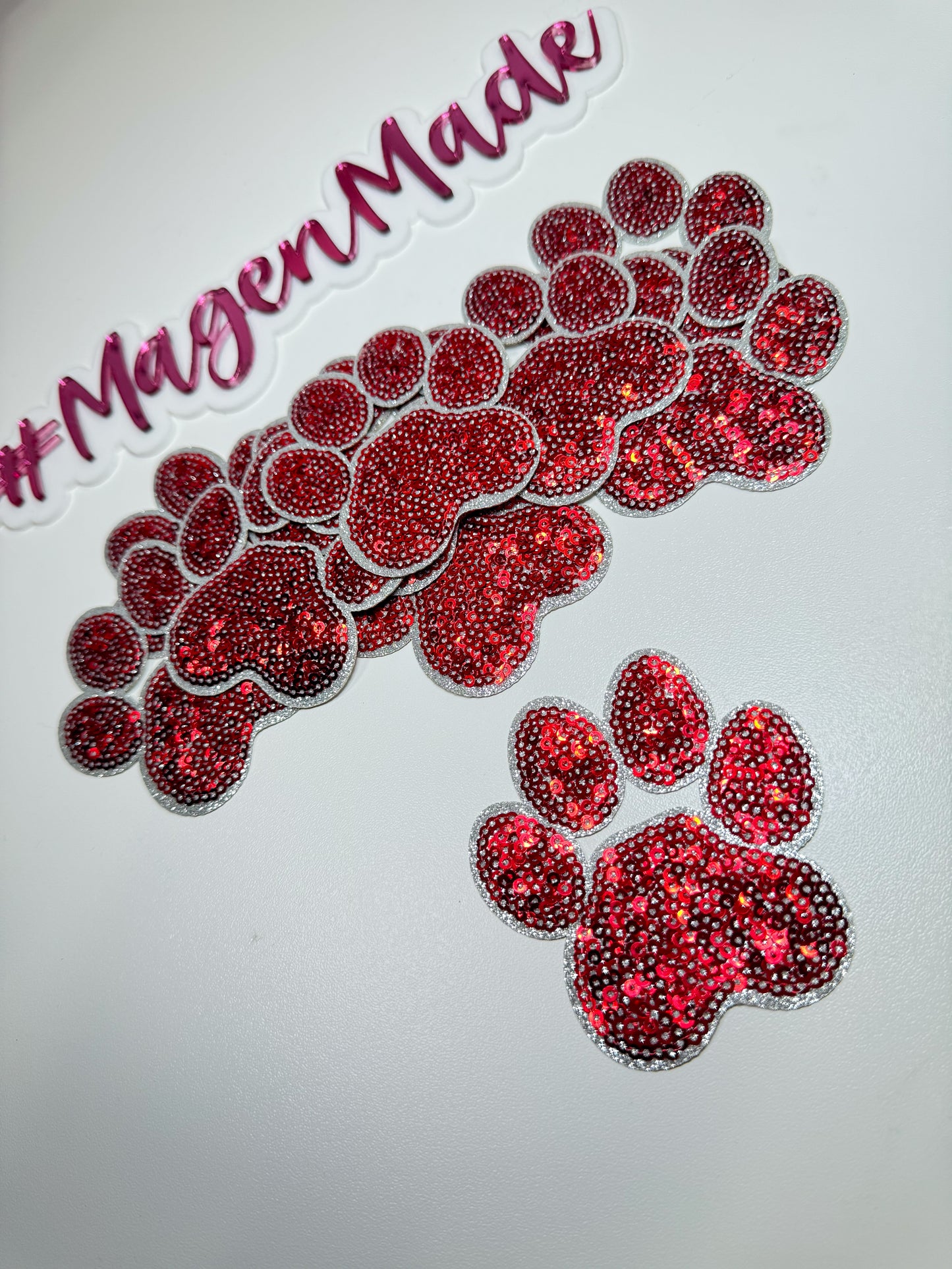 Red paw print sequin patch