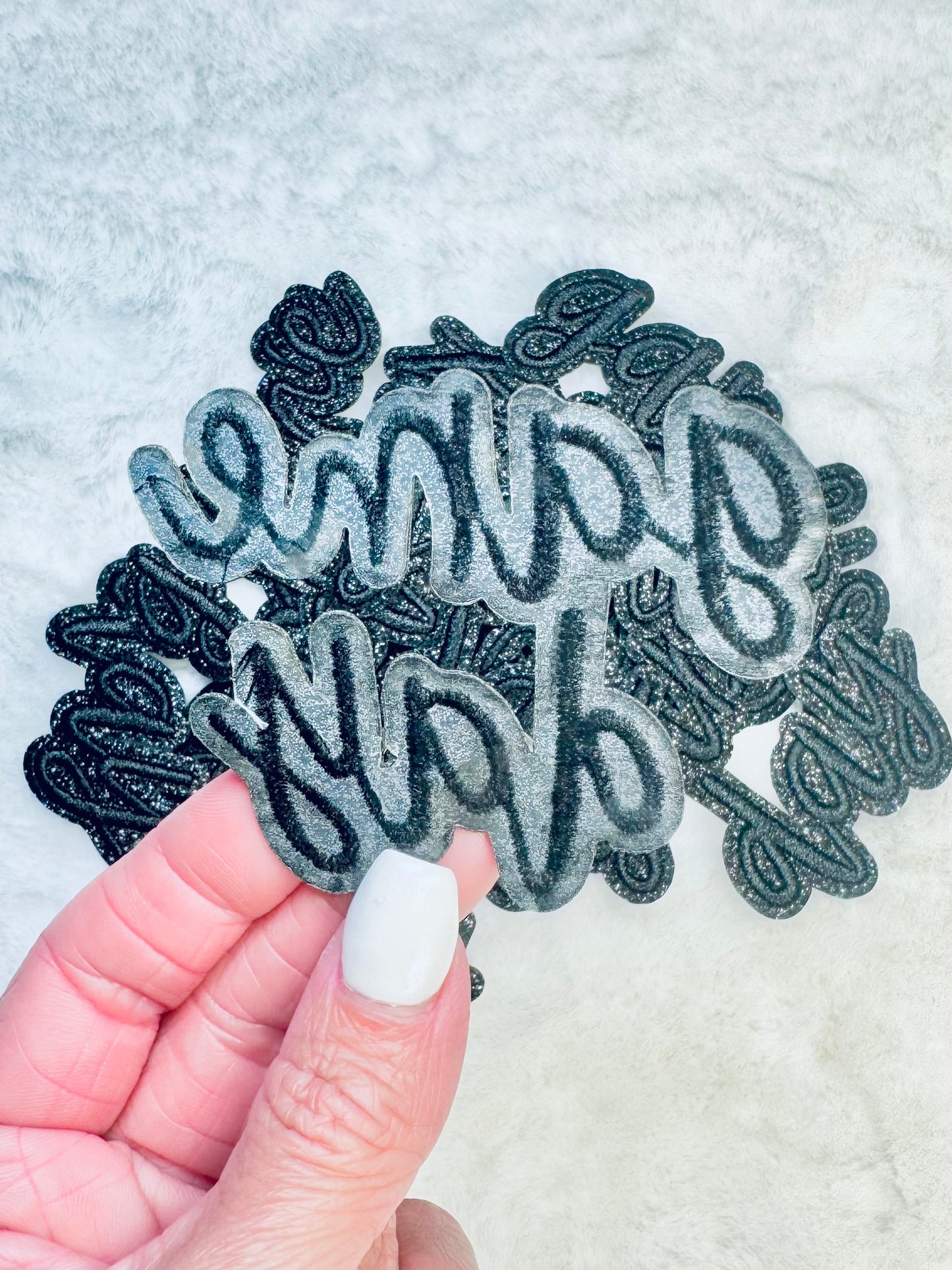 The back of the Black On Black Glitter Game Day Embroidered Patch