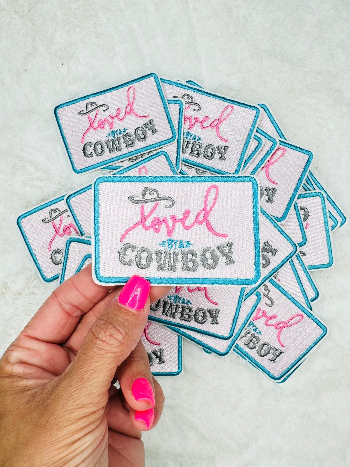 Loved by a cowboy embroidered patch