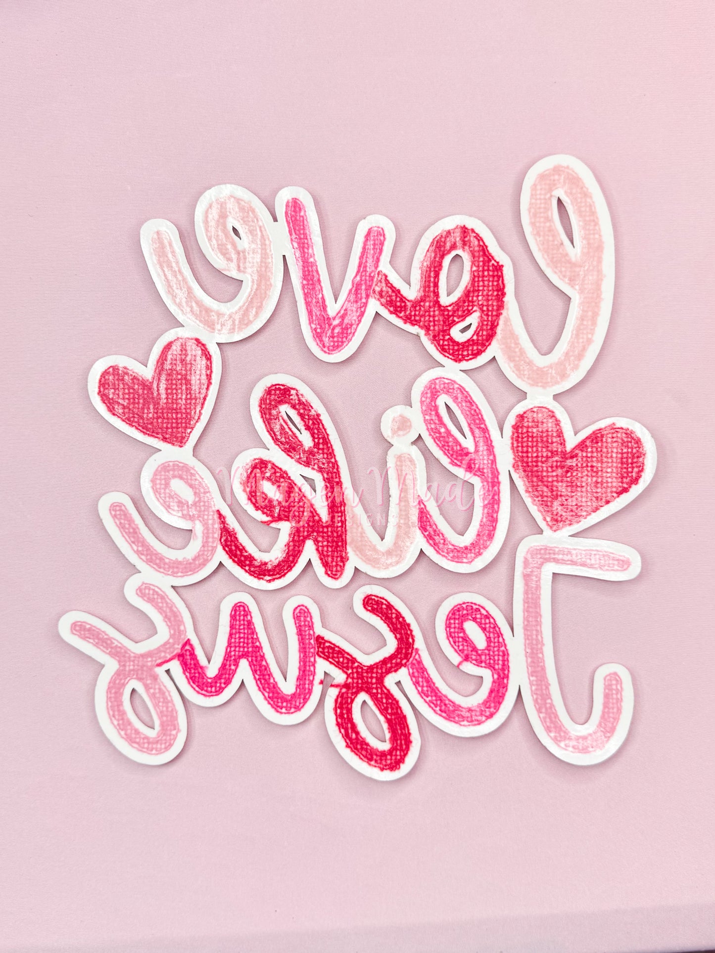 The back of the Love Like Jesus Chenille and Glitter Iron On Patch