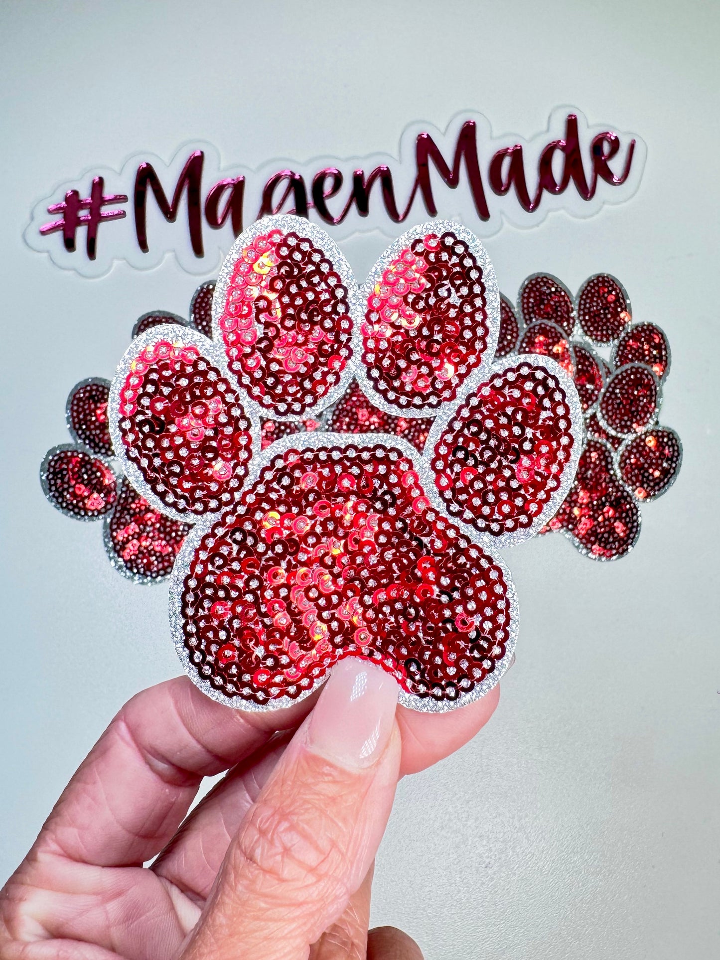 Red paw print sequin patch