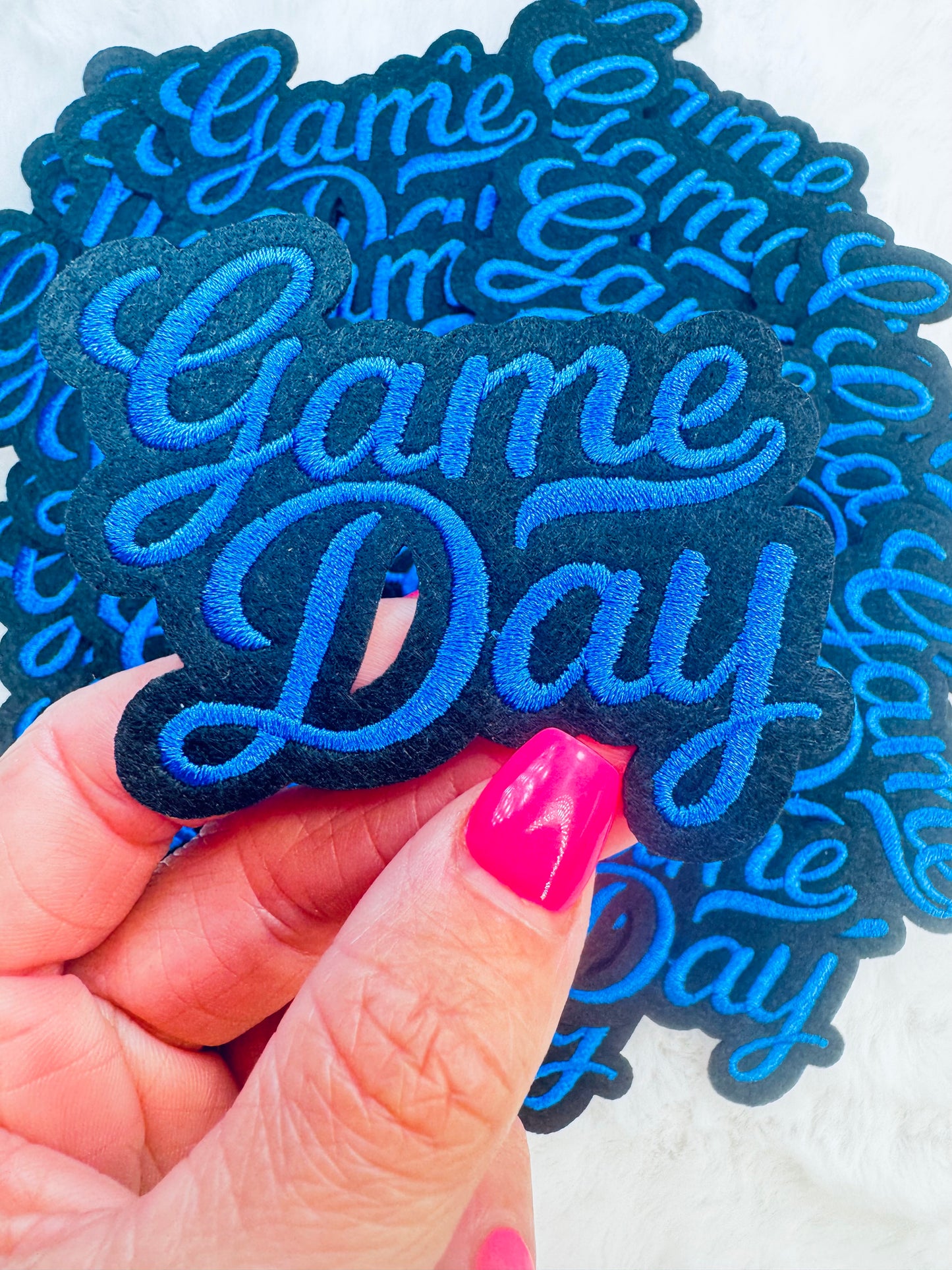 A close up of the Blue Game Day Embroidered Patch