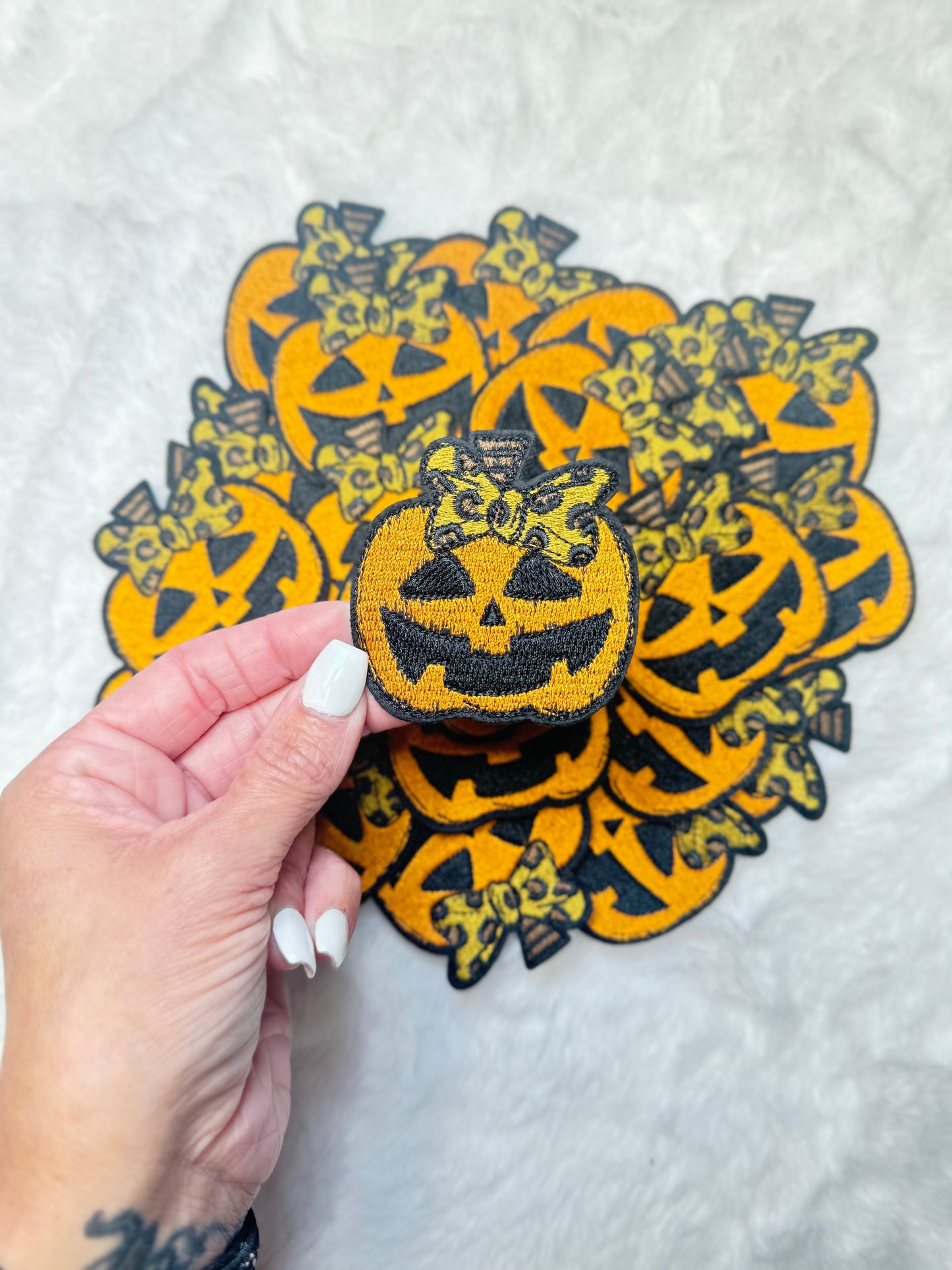 Carved Pumpkin With A Leopard Coquette Bow Embroidered Patch