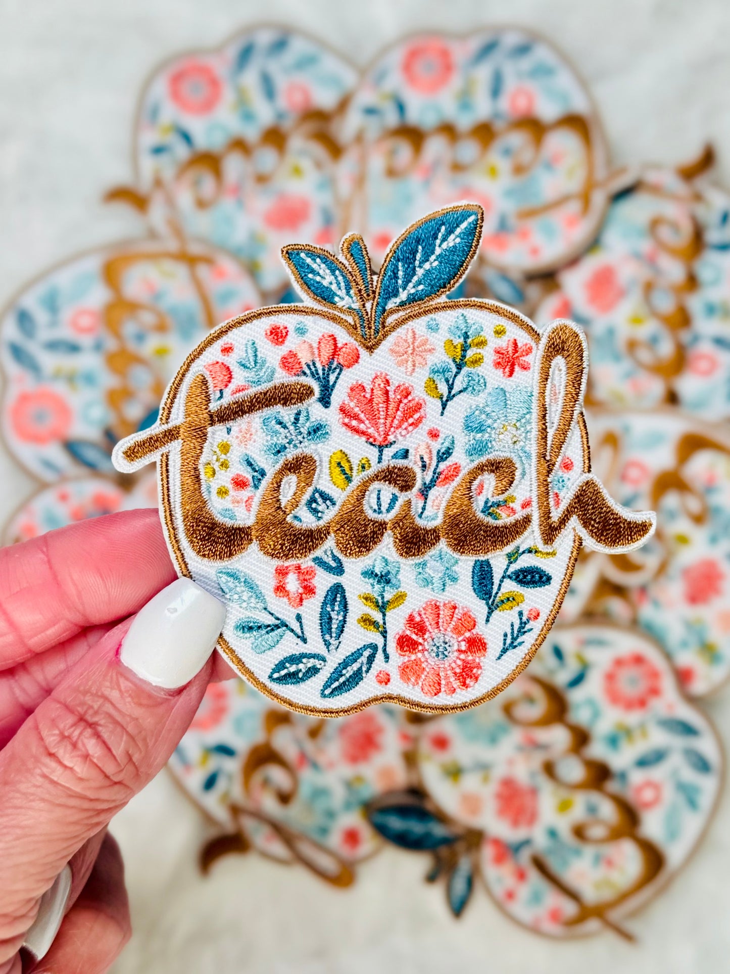 Up close shot of the Boho Fall Teach Apple Embroidered Patch