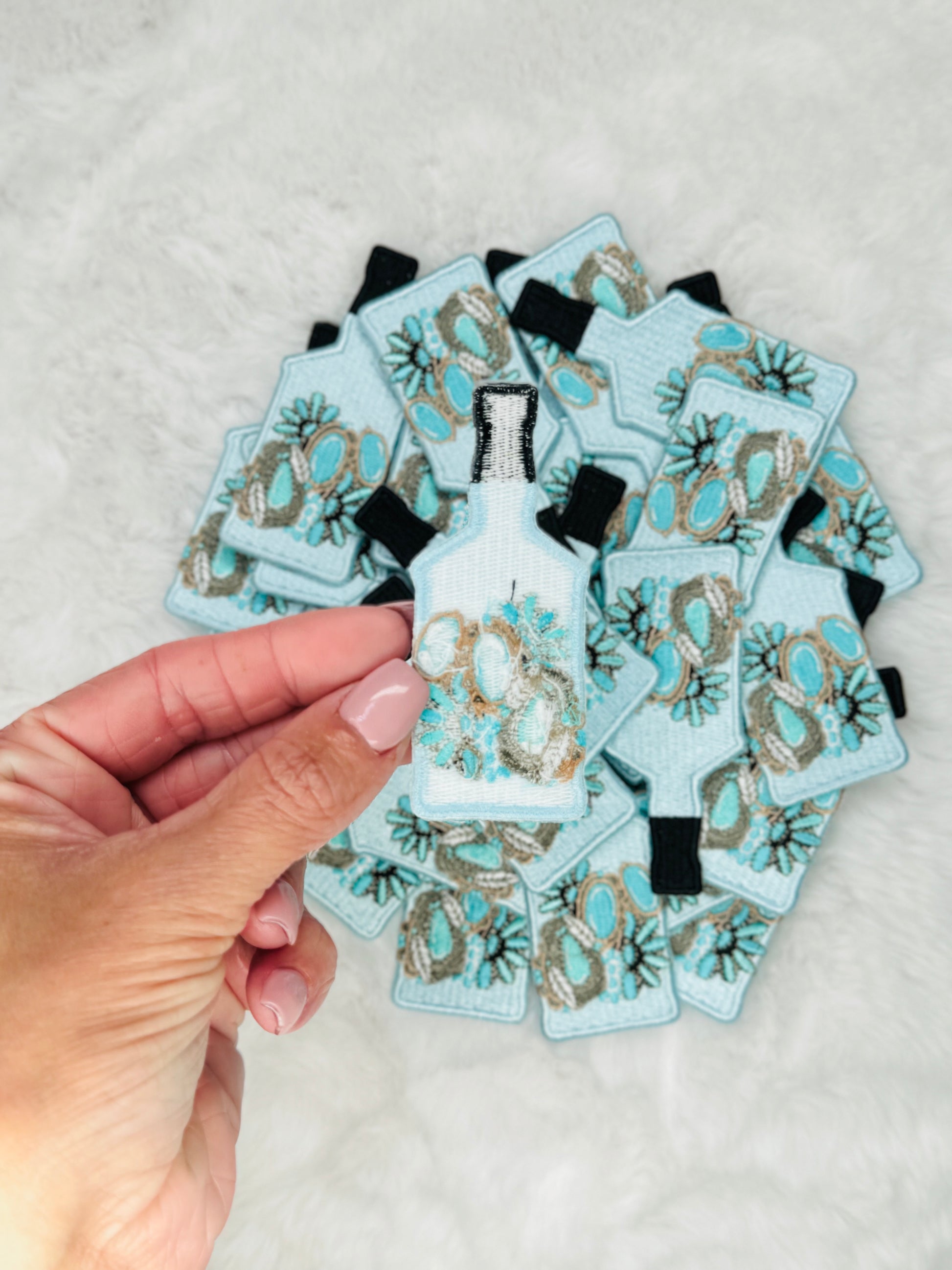 The back of the Bottle of Turquoise Jewels Embroidered Patch